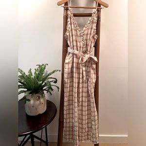 Cream and rust ruffle jumpsuit with belt and pockets